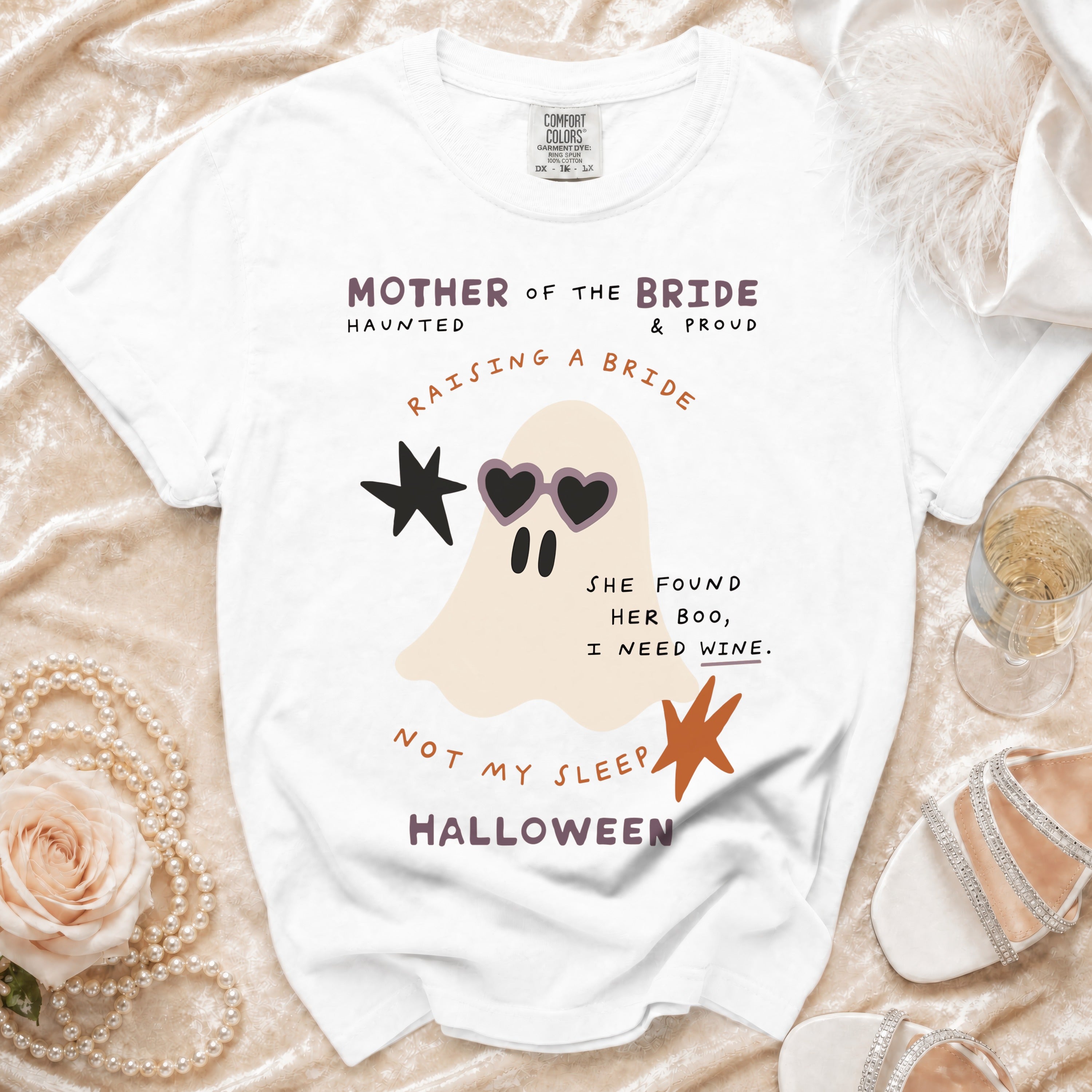 White t-shirt with "Mother of the Bride" graphic, a ghost, and Halloween text.