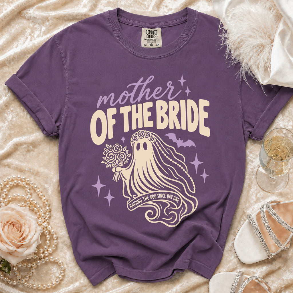 Purple t-shirt with "Mother of the Bride" text and ghost graphic.