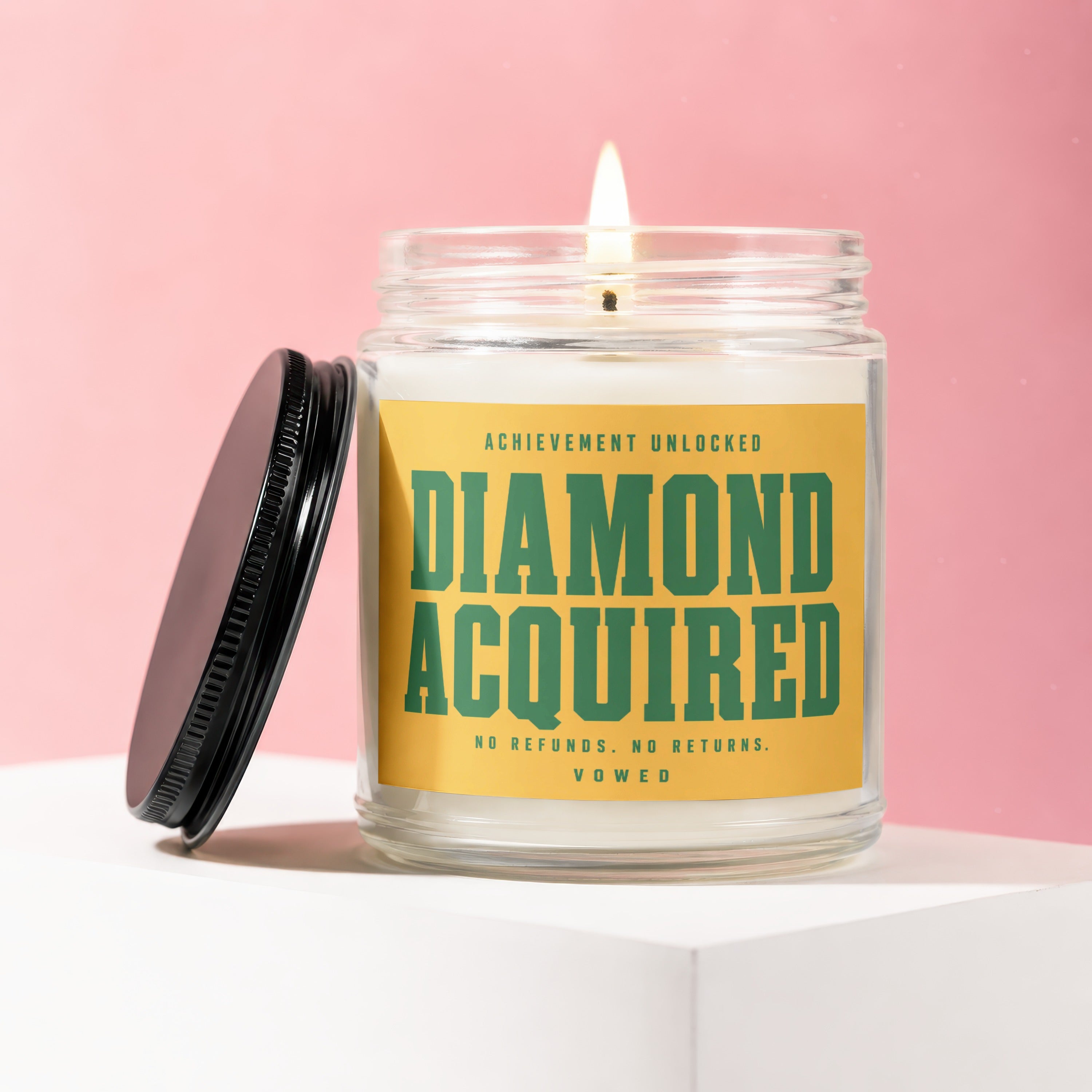 Candle with text "Achievement Unlocked Diamond Acquired No Refunds No Returns Vowed".