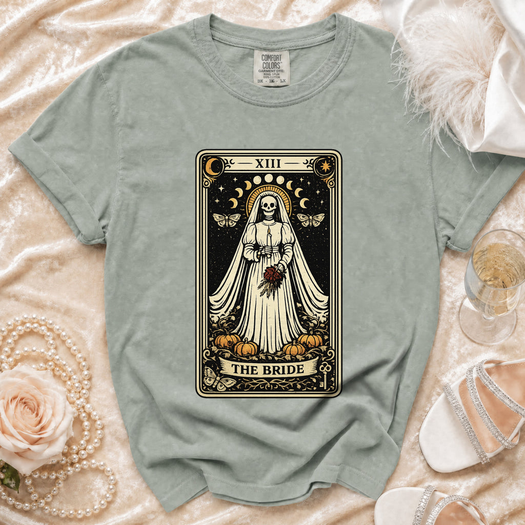 T-shirt with a tarot card design of "The Bride" skeleton in a wedding dress.