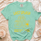 Mint green t-shirt with "Last Splash" and pool party graphics.