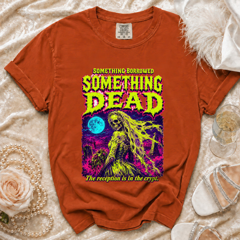 Orange t-shirt with skeleton bride graphic and text "The reception is in the crypt."