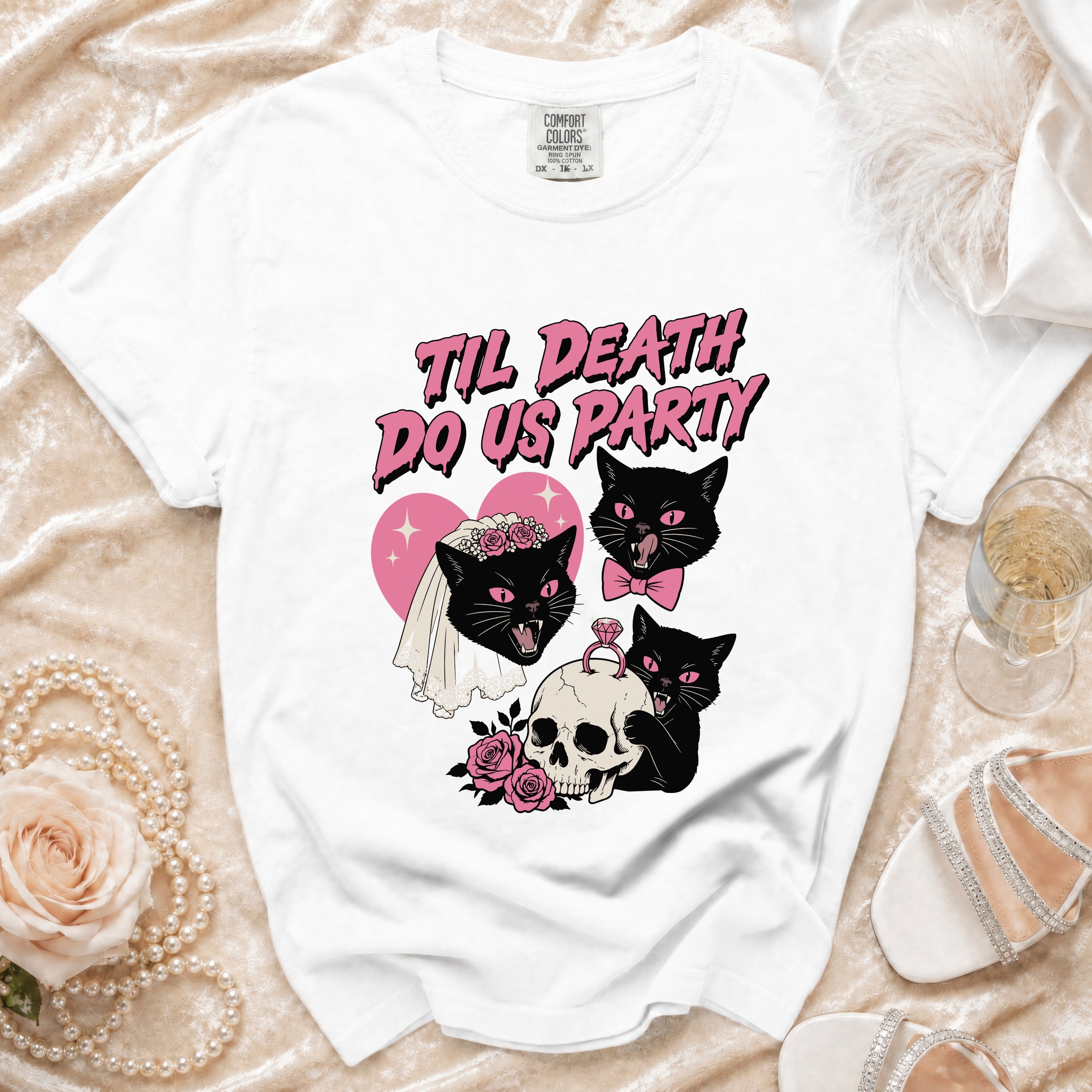 White t-shirt with "Til Death Do Us Party" text and black cats.