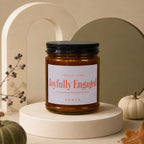 Amber jar candle "Joyfully Engaged" smells like one proposal was never enough.
