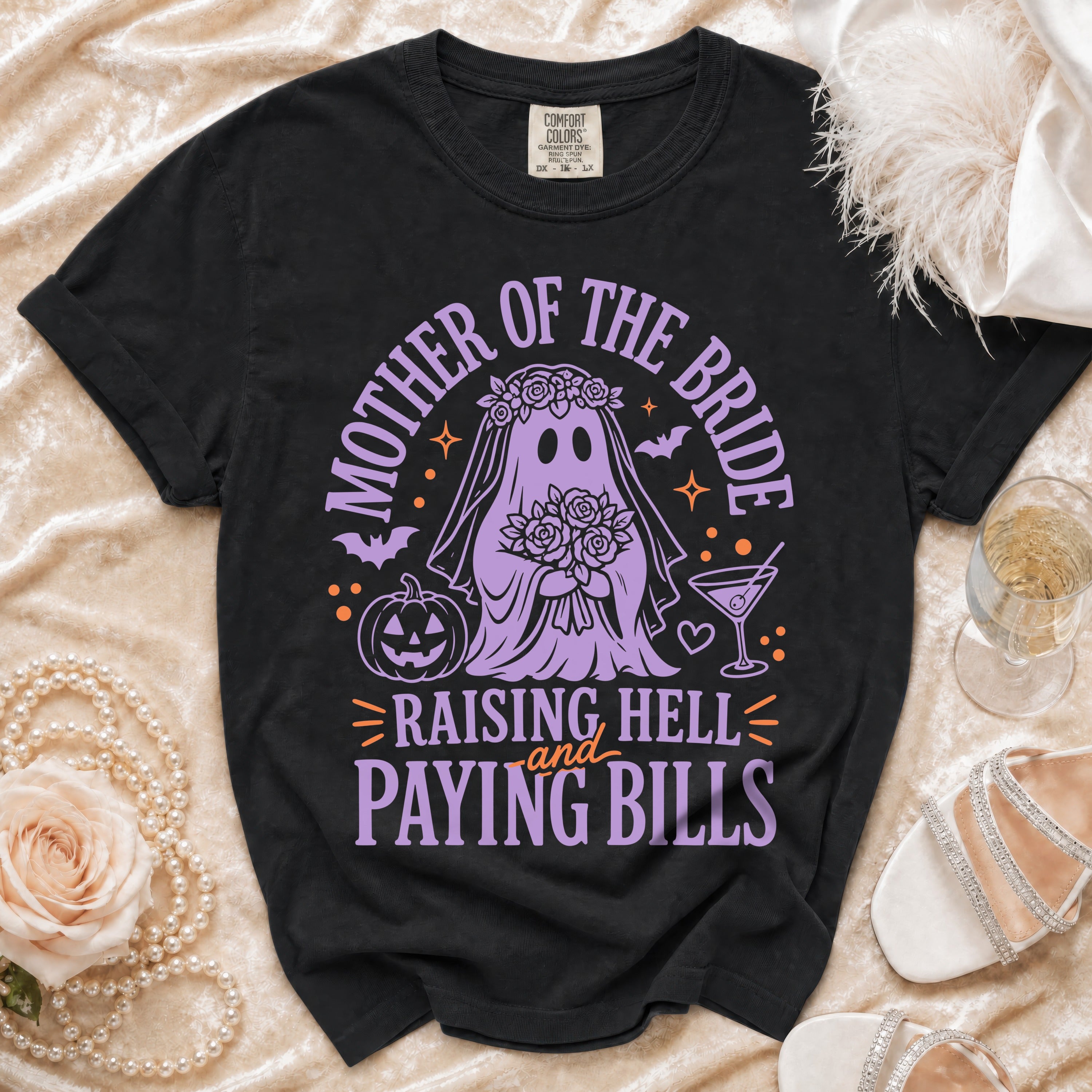 Black t-shirt with "Mother of the Bride Raising Hell and Paying Bills" text.