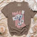 Brown t-shirt with "Maid of Honor" and cocktail graphic with stamps.