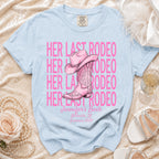 Light blue t-shirt with pink text and cowboy boot graphic: "HER LAST RODEO Jennifer's Bach Nashville Summer 2026".