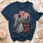 Dark blue t-shirt with "Mother of the Bride... and the Night Survivor" graphic.