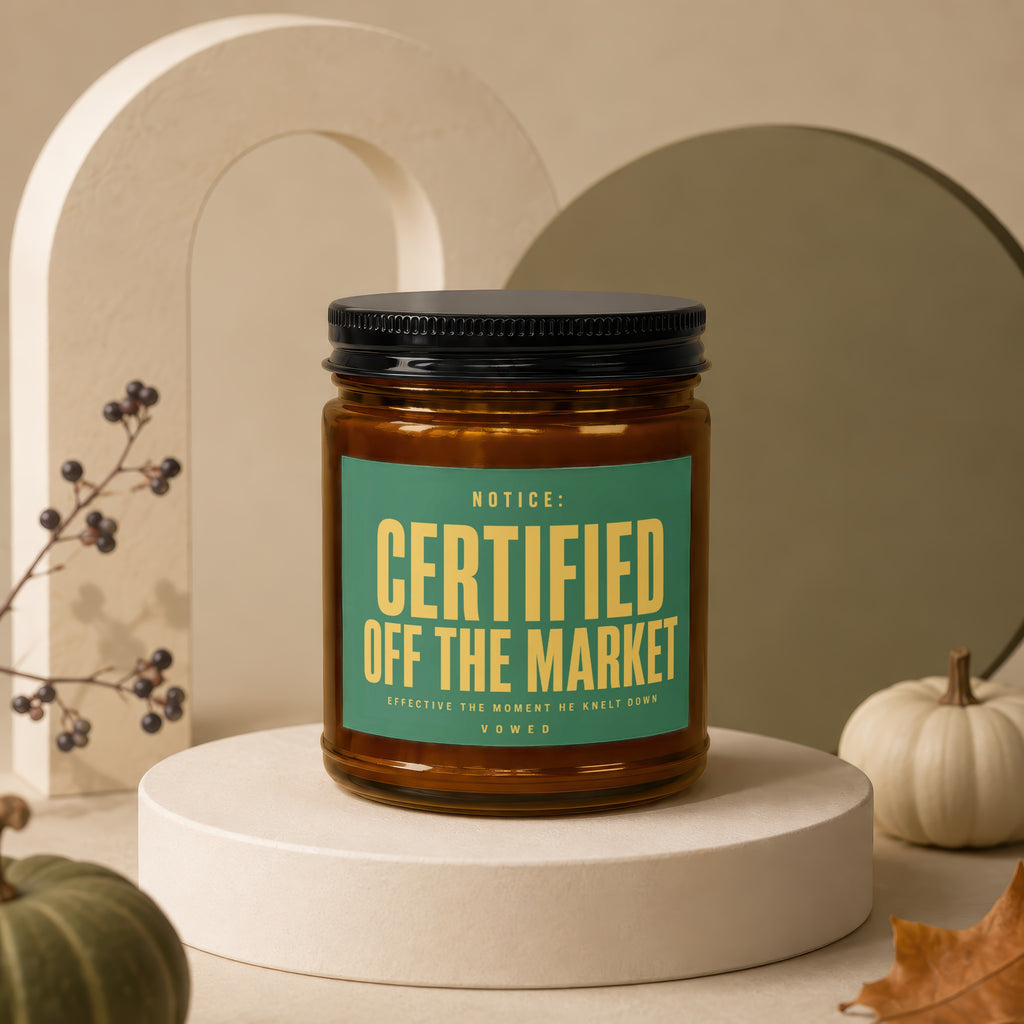 Amber jar candle with green label text "CERTIFIED OFF THE MARKET".