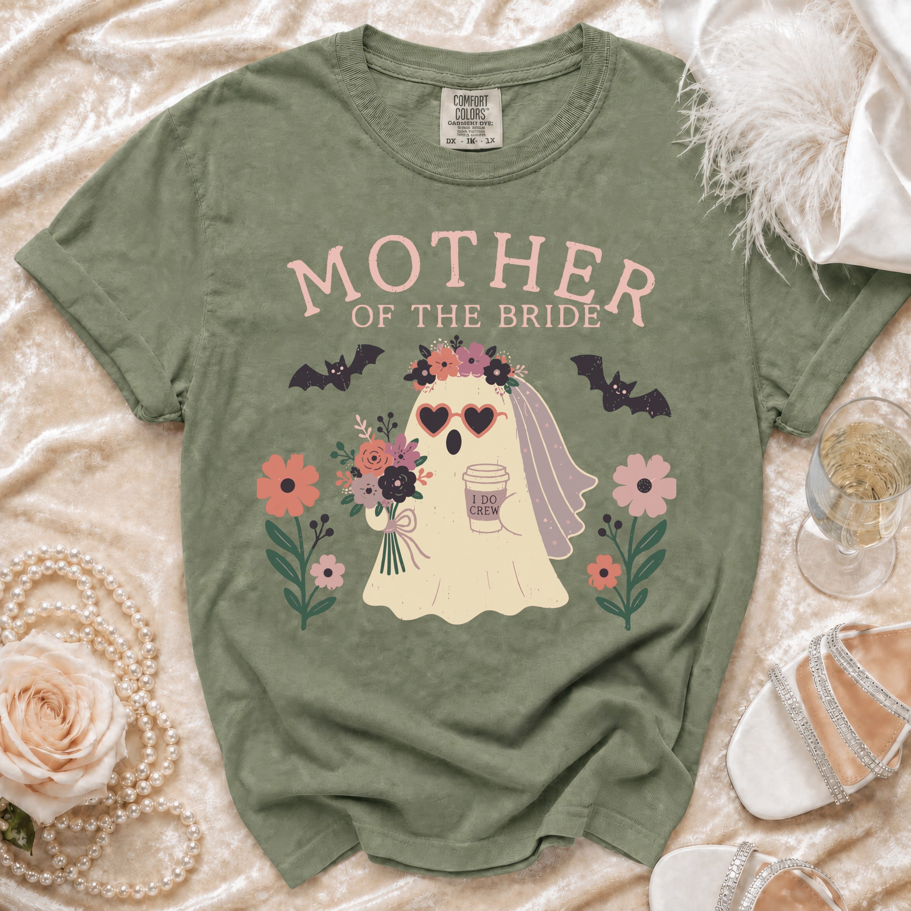Green t-shirt with "Mother of the Bride" and a ghost graphic holding coffee.