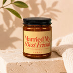 Amber candle with label "Married My Best Friend" and "VOWED" at bottom.