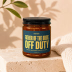 Amber jar candle with dark blue label reading "Father of the Bride Off Duty".