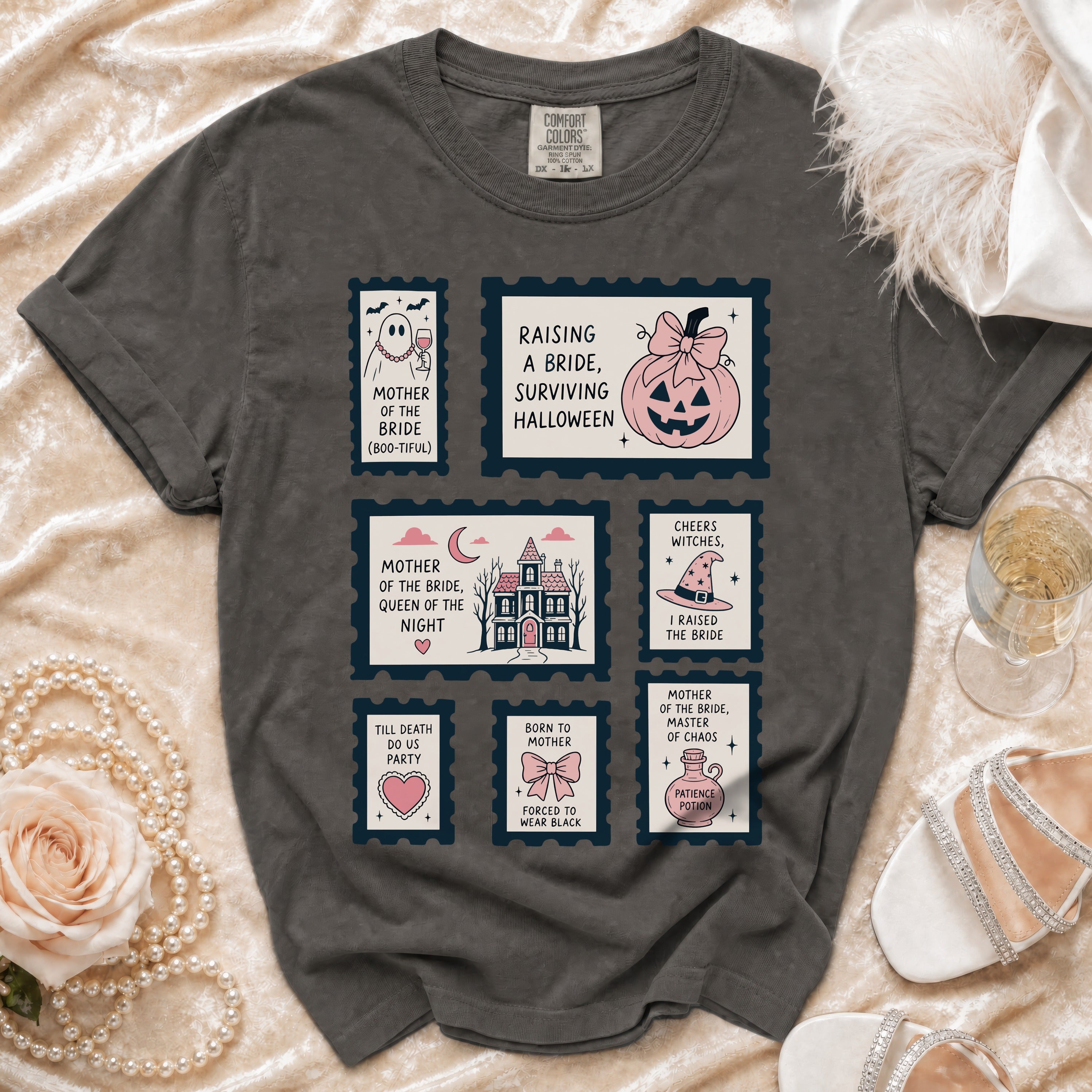 Dark gray t-shirt with Halloween-themed "mother of the bride" graphics in stamp designs.