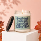 Glass candle with label "Boyfriend Hubby & Girlfriend Wifey Vibes".
