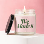 Jar candle with pink label reading "Smells Like We Made It" on a pink background.
