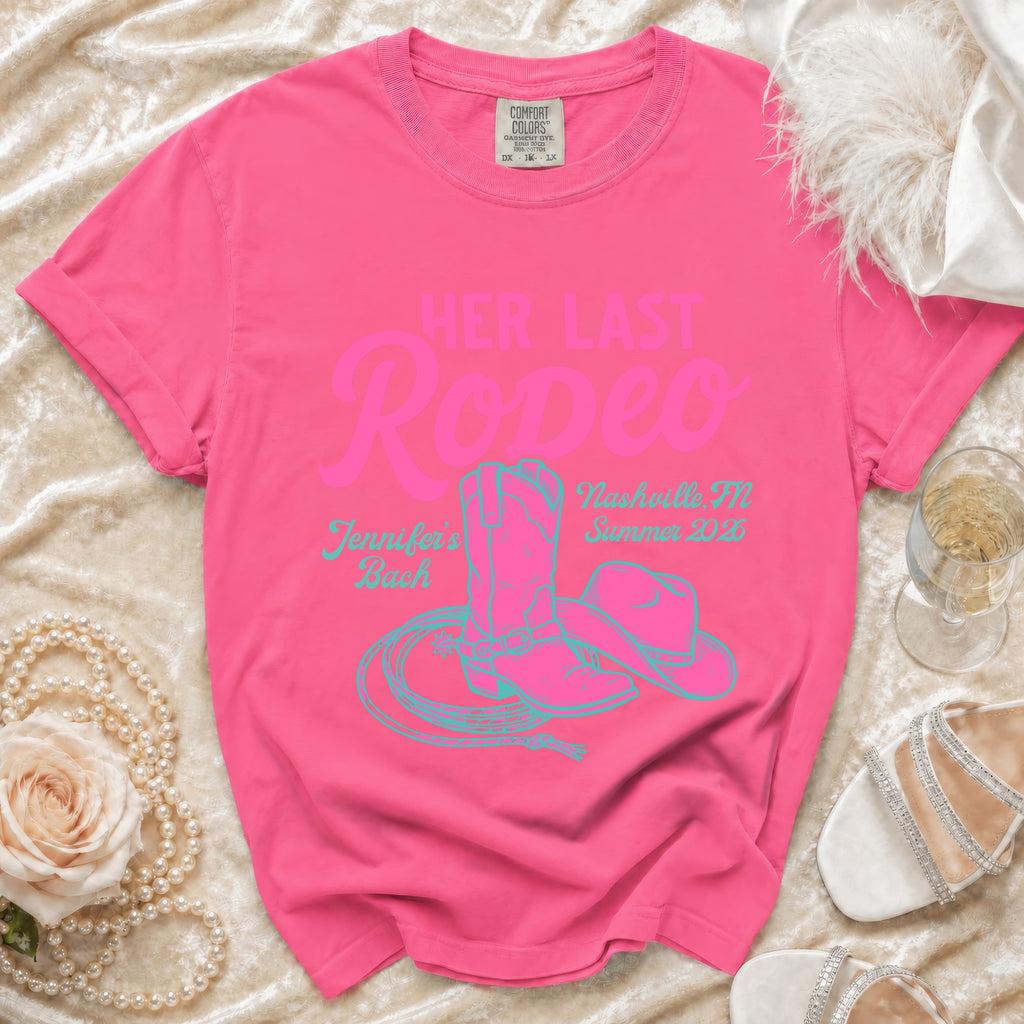 Pink t-shirt with "Her Last Rodeo" and cowboy boot and lasso design.