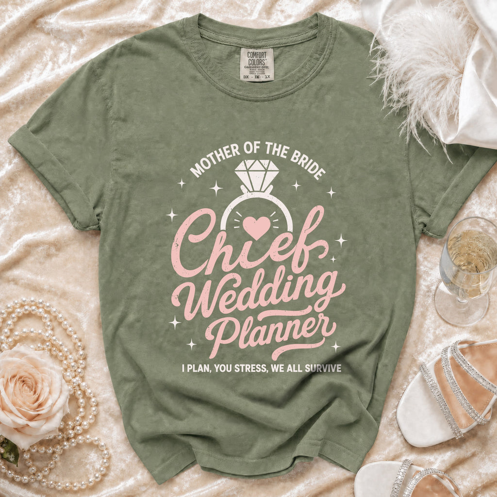 Green t-shirt with "Mother of the Bride Chief Wedding Planner" text and diamond ring graphic.