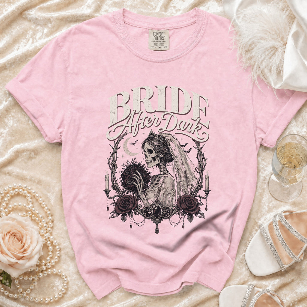 Pink t-shirt with "Bride After Dark" text and a skeleton bride graphic.