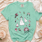 Green t-shirt with wedding-themed doodles: bride, dress, cake, rings, car, and flowers.