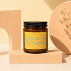 Amber jar candle with black lid and yellow label reading "You're Married. I'm Napping.".