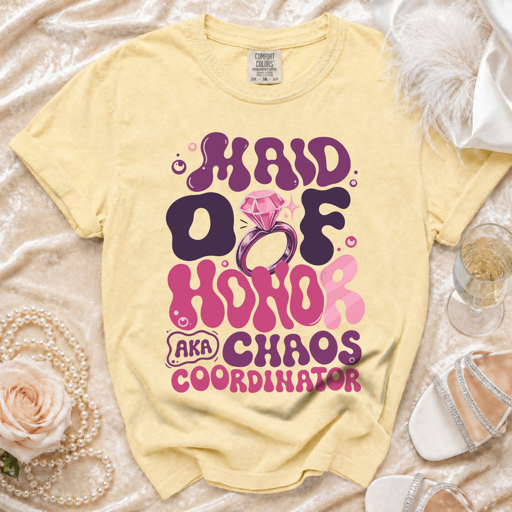 Yellow t-shirt with "Maid of Honor AKA Chaos Coordinator" text and a diamond ring graphic.
