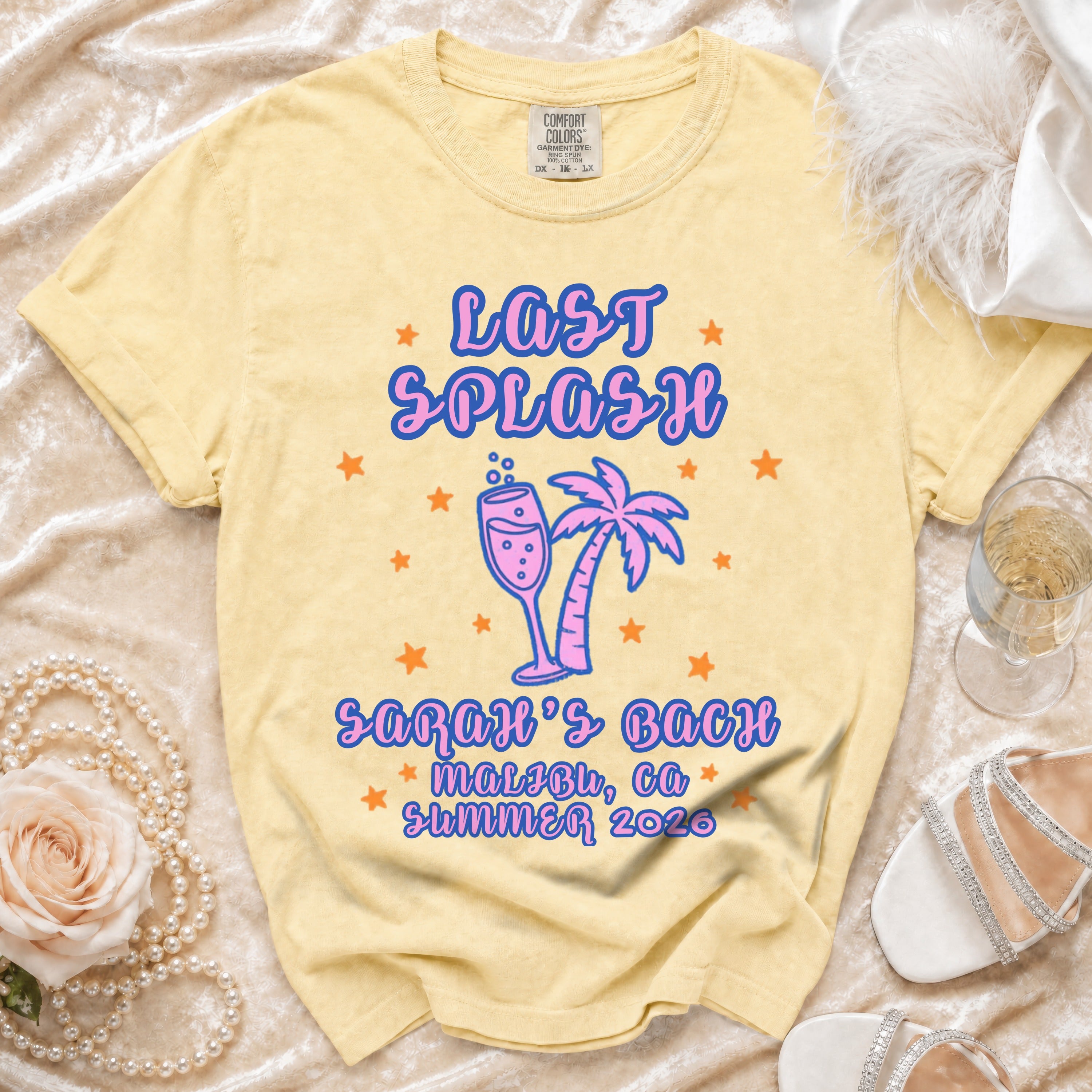 Yellow t-shirt with "Last Splash Malibu, Ca Summer 2026" and palm tree graphic.