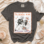 T-shirt with skeletons in wedding attire and "Til Death €22" text.