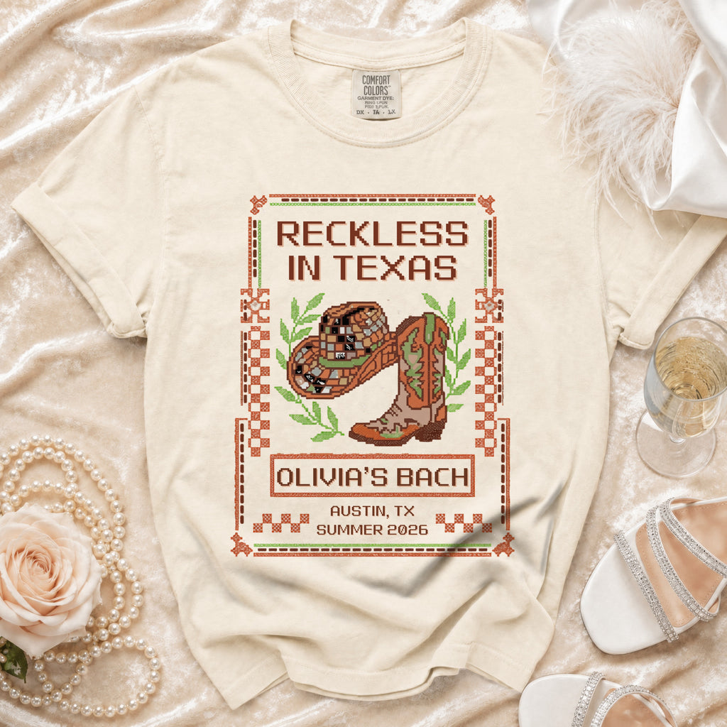 T-shirt with "Reckless in Texas" text, cowboy hat, and boots for Olivia's Bach, Austin, TX.