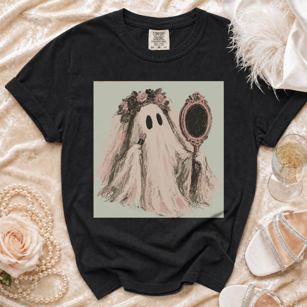 Black t-shirt with graphic of a ghost with a flower crown holding lipstick and a mirror.