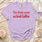 Purple t-shirt with red text "This Bride needs an Iced Coffee".