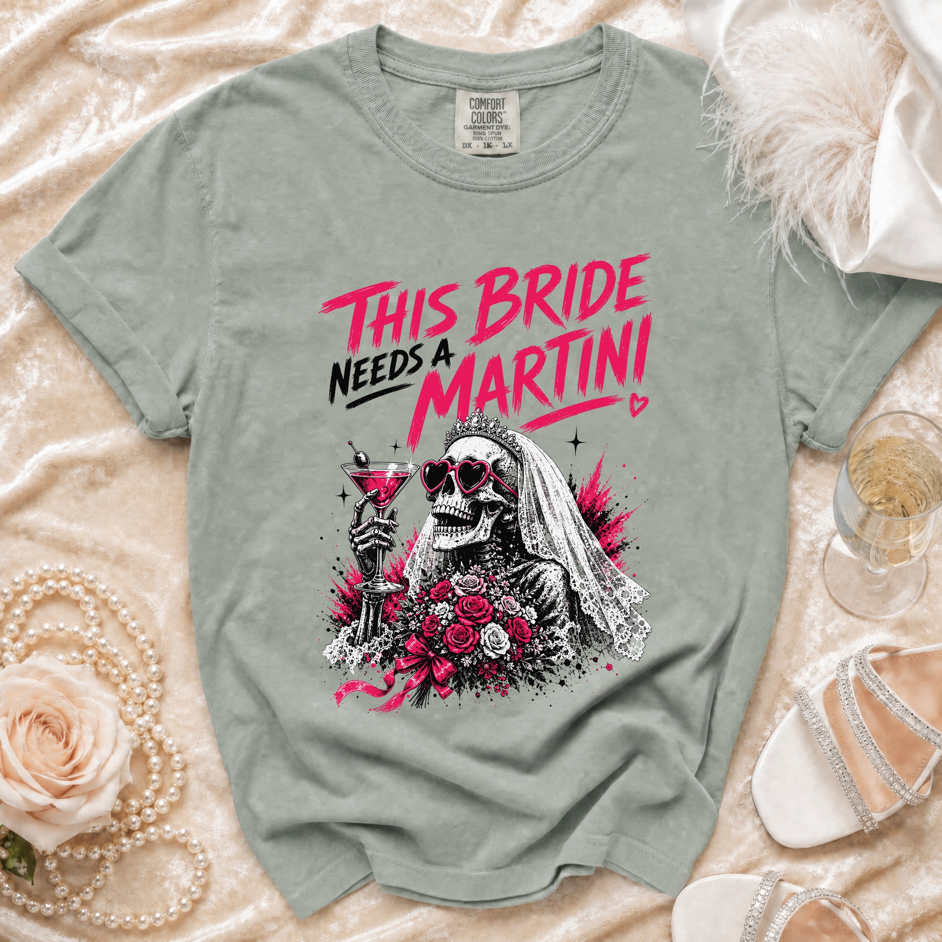 T-shirt with skeleton bride graphic and "This Bride Needs a Martini" text.
