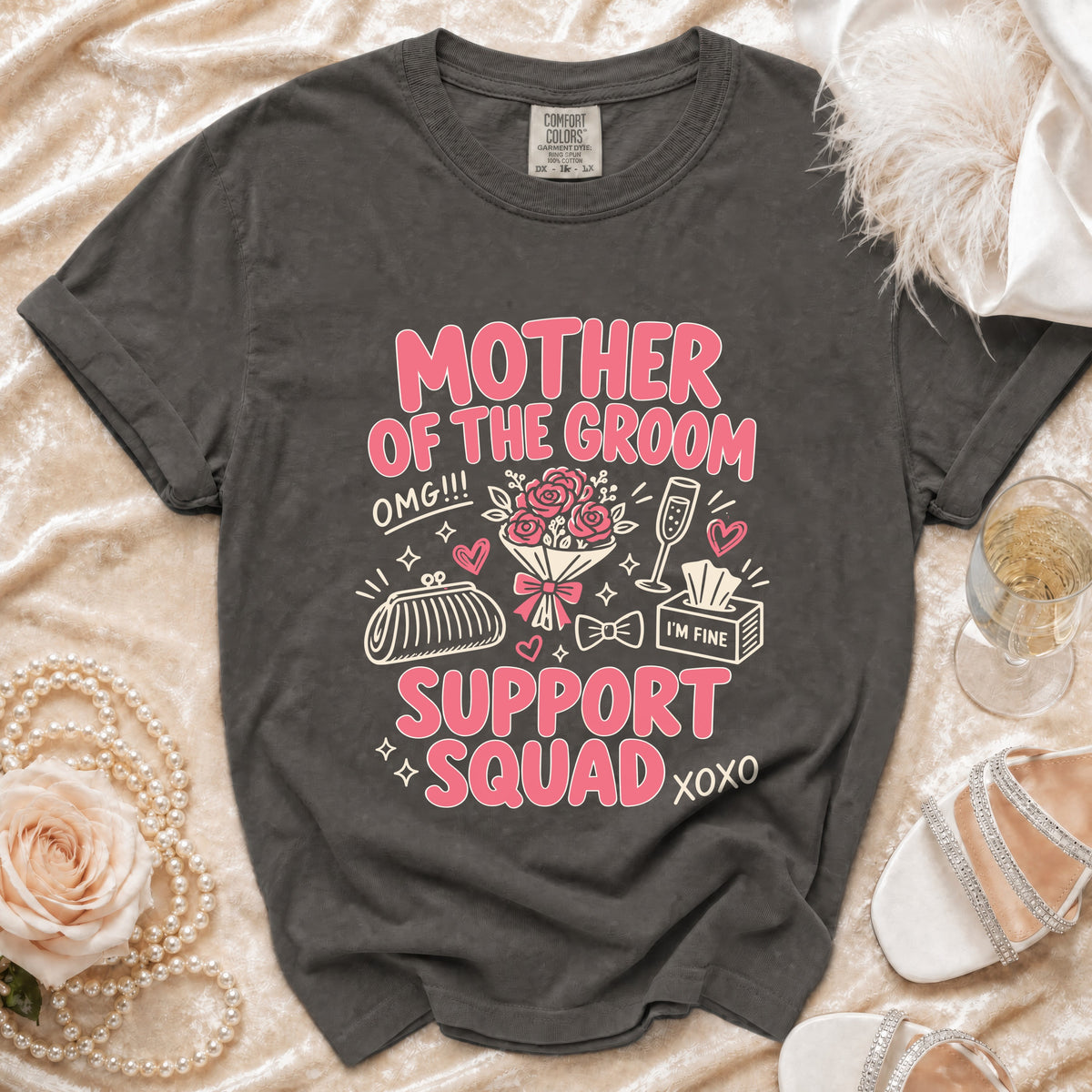 T-shirt with "Mother of the Groom Support Squad" graphic and wedding accessories.