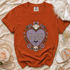 Orange t-shirt with a gothic heart graphic saying "Til Death Do Us Part".