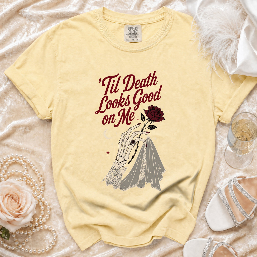 Yellow t-shirt with skeleton hand, rose, and text "'Til Death Looks Good on Me".