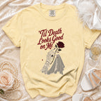 Yellow t-shirt with skeleton hand, rose, and text "'Til Death Looks Good on Me".
