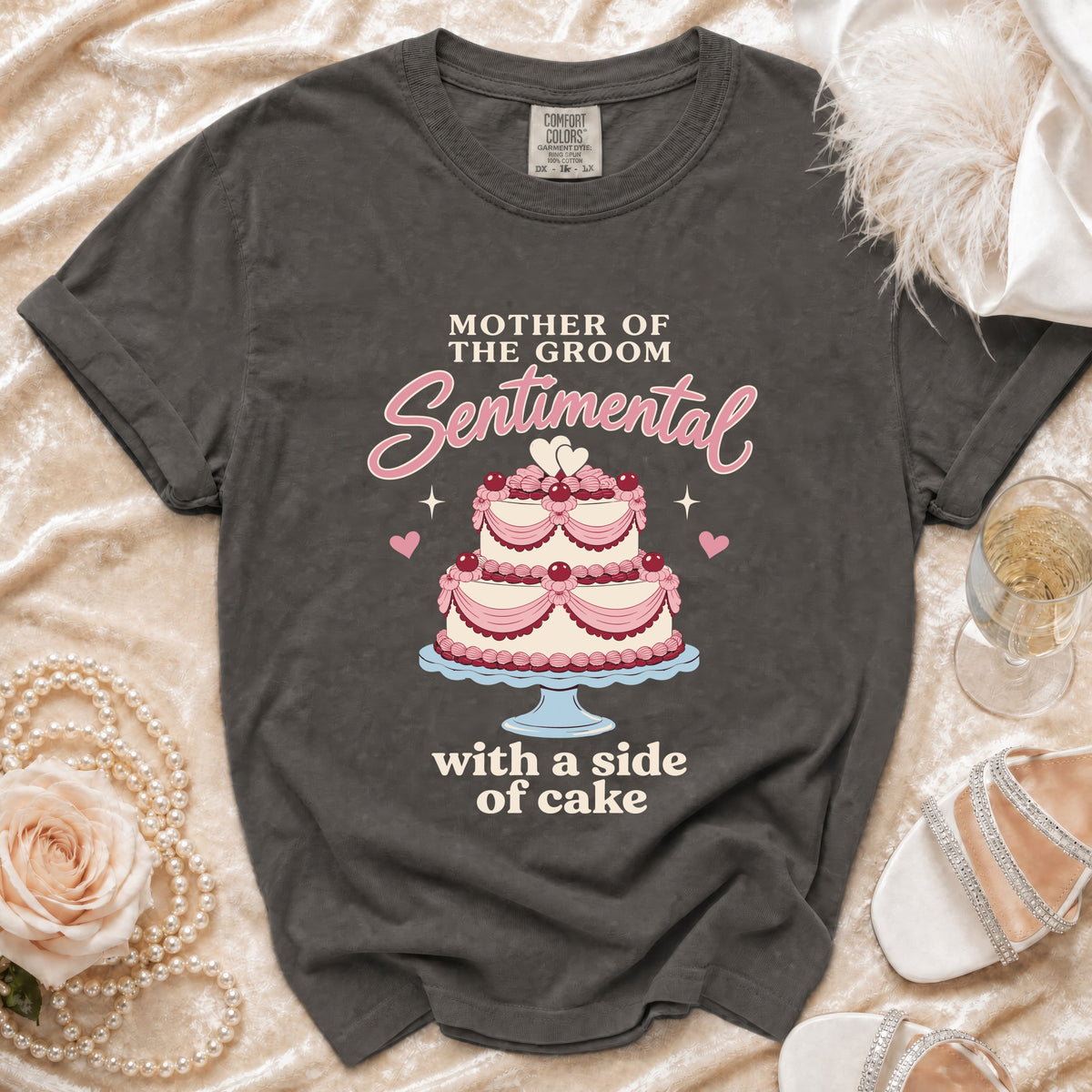 T-shirt with "Mother of the Groom Sentimental with a side of cake" text.