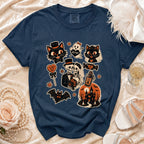Navy t-shirt with Halloween-themed graphics including cats, skulls, and haunted house.