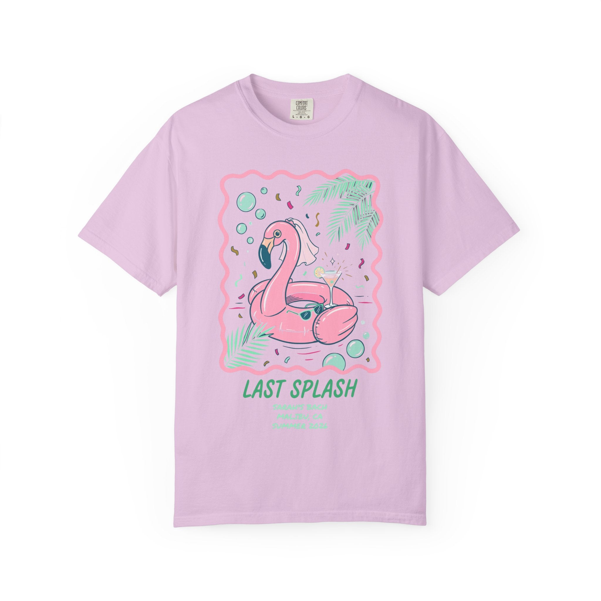 Pink flamingo float with "Last Splash" text on a light purple t-shirt.