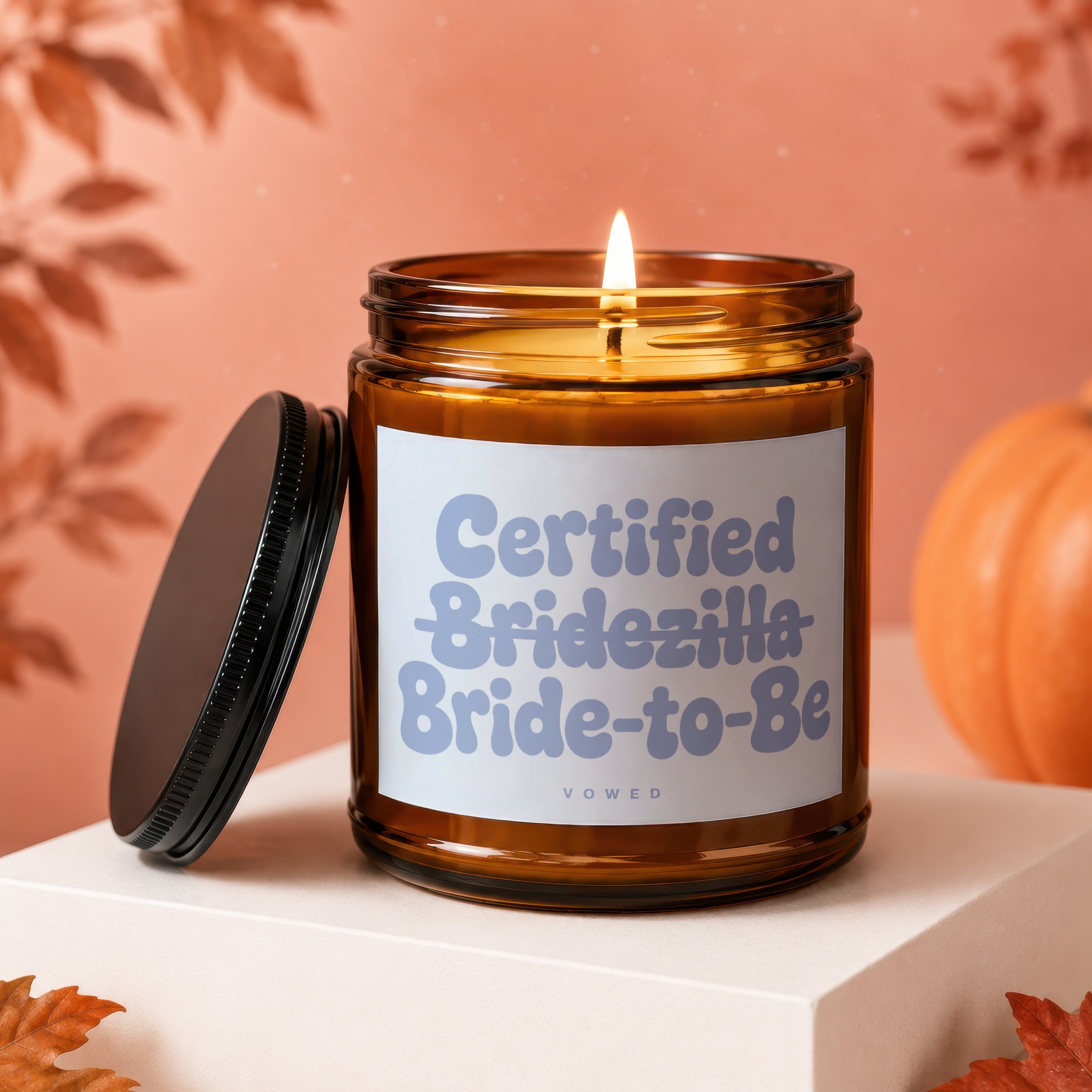Amber candle with label reading "Certified Bridezilla Bride-to-Be Vowed".