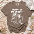 Brown t-shirt with "Mother of the Bride Club" and graphic art.