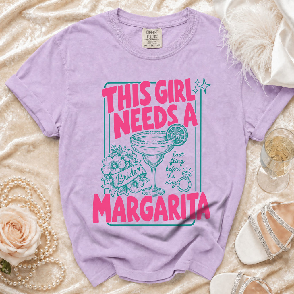 Purple t-shirt with "This Girl Needs a Margarita" graphic and wedding details.
