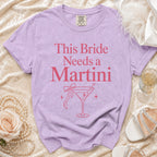 Lavender Comfort Colors t-shirt with "This Bride Needs a Martini" graphic.