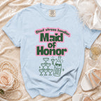 Light blue t-shirt with "Chief stress handler. Maid of Honor" and a champagne bottle graphic.