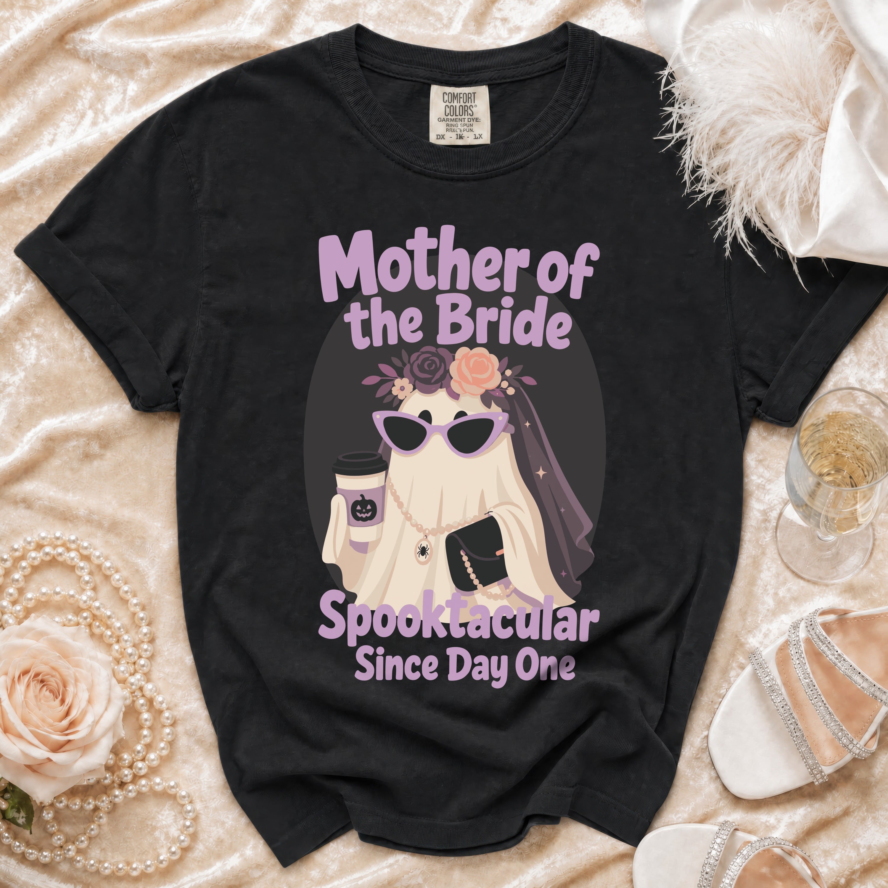 Black t-shirt with "Mother of the Bride Spooktacular Since Day One" text and ghost graphic.