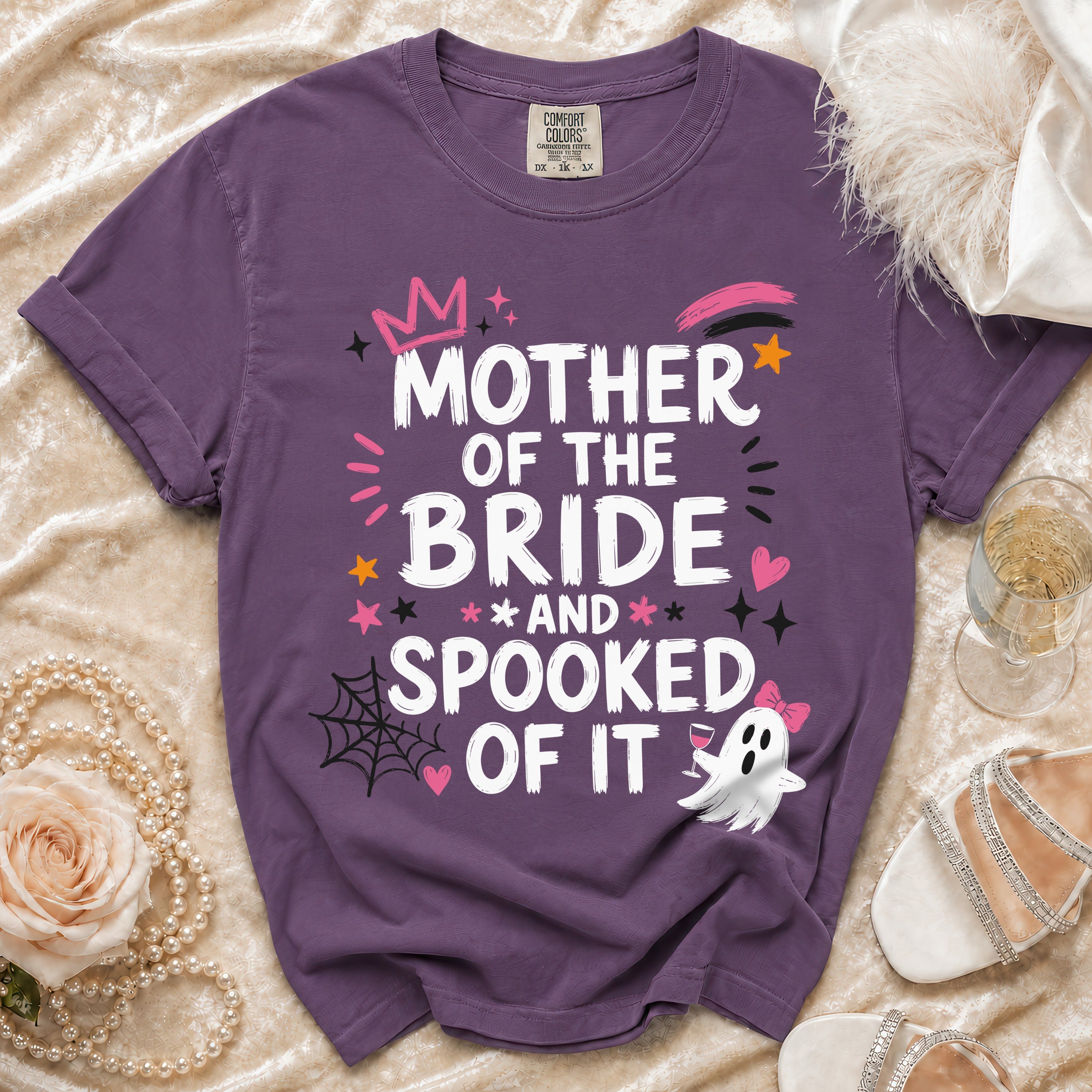 Purple t-shirt with "Mother of the Bride and Spooked of It" text and Halloween graphics.