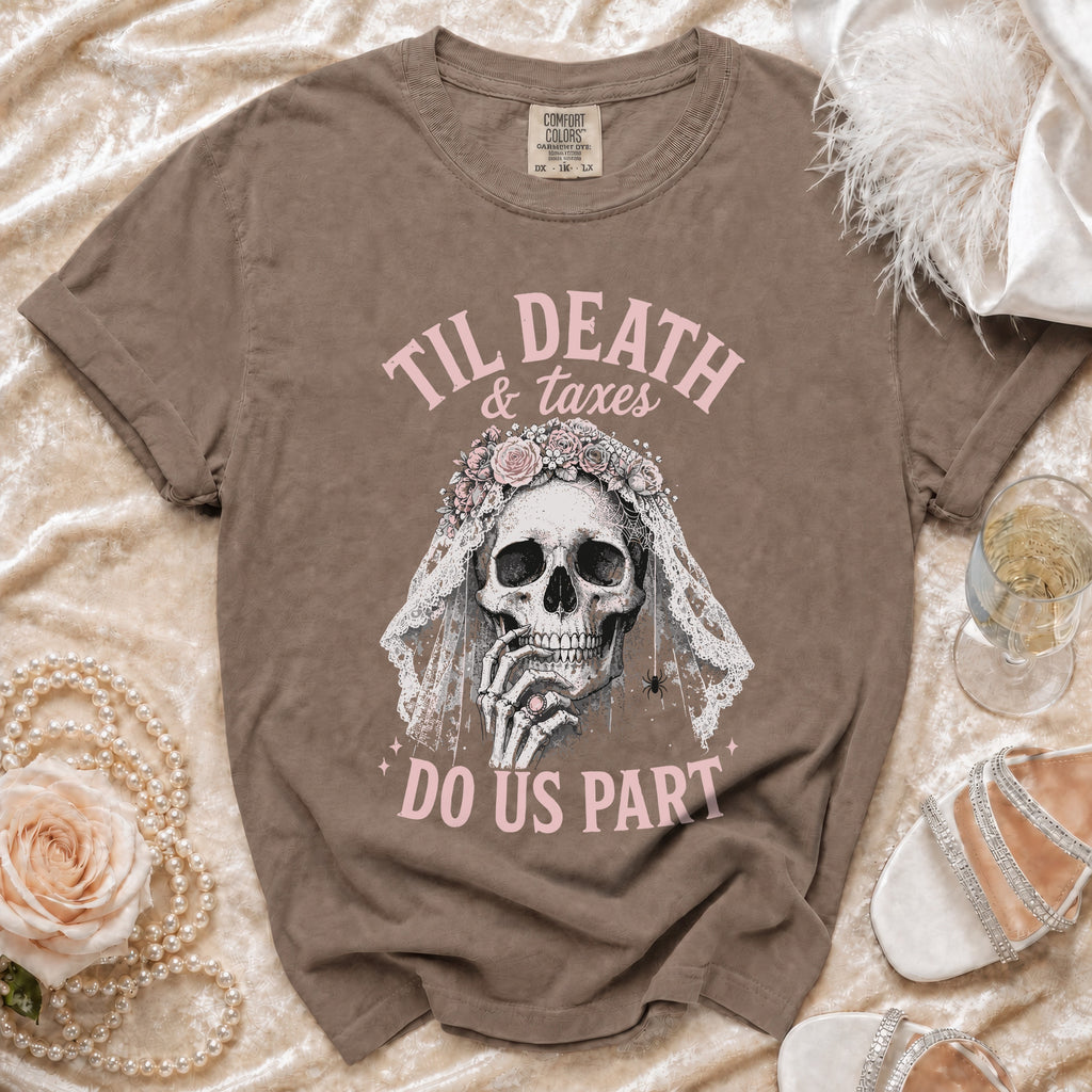 Brown t-shirt with skull wearing a floral veil, reading "Til Death & taxes do us part".