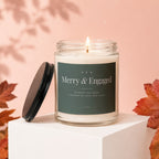 Candle labeled "Merry & Engaged" with "wishing you both a season of love and light."