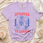 Purple t-shirt with spooky bride skeleton graphic and text "SPOOKED TO COMMIT".
