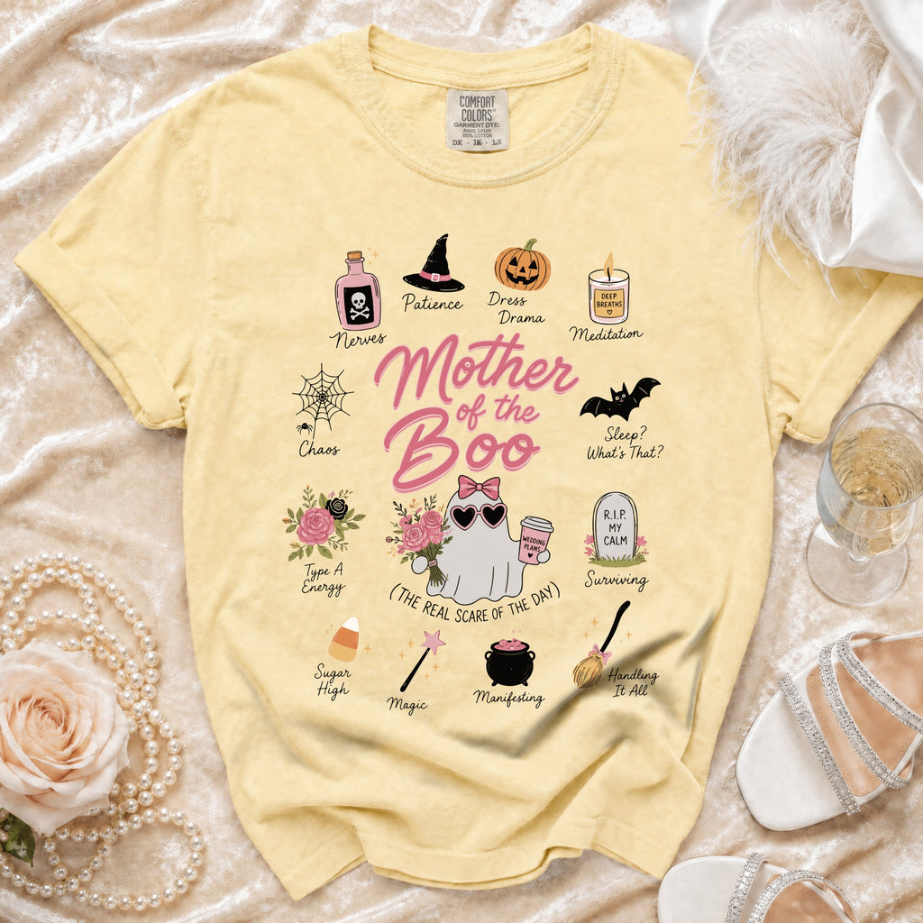Yellow t-shirt with "Mother of the Boo" graphic and Halloween-themed illustrations.