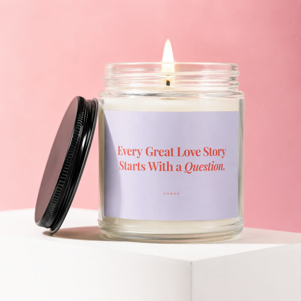 Candle with text "Every Great Love Story Starts With a Question."